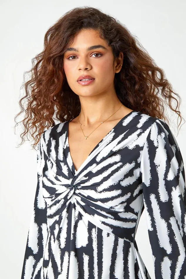 Ivory Abstract Print Twist Front VNeck Stretch Top Women Roman Tops