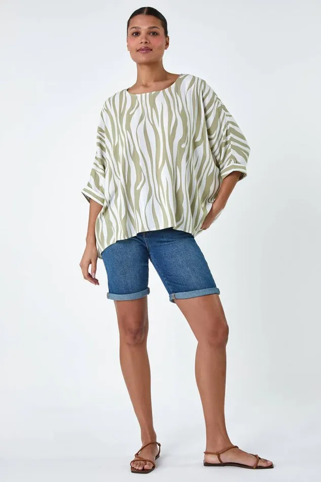 Ivory Animal Button Back Batwing Top Women Roman Tops