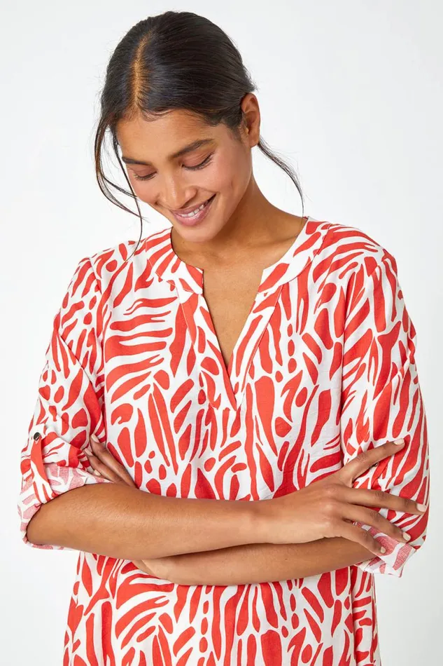 Orange Spot Print VNeck Hanky Hem Tunic Top Women Roman Tops
